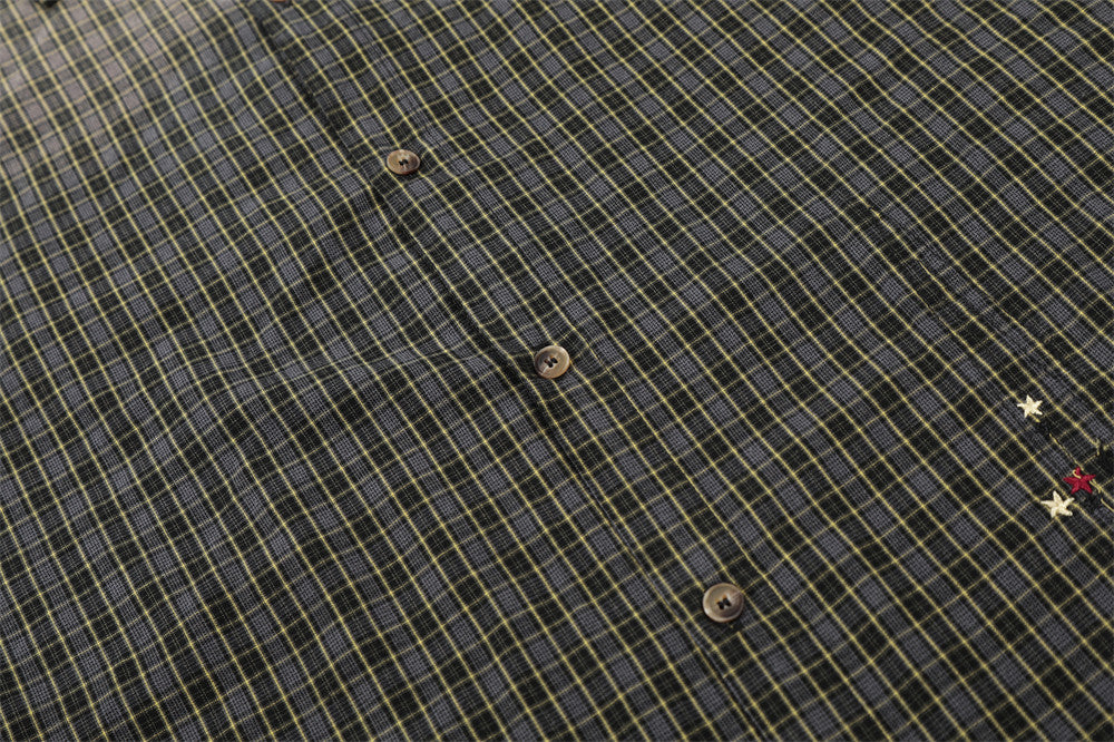 DAXUEN Oversized plaid button-up shirt with frayed edges