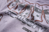DAXUEN Washed oversized graphic t-shirt with dollar bills and 'misery' print