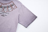 DAXUEN Washed oversized graphic t-shirt with dollar bills and 'misery' print
