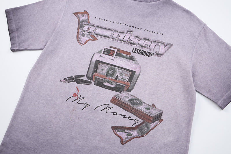DAXUEN Washed oversized graphic t-shirt with dollar bills and 'misery' print