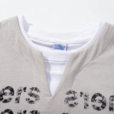 DAXUEN Layered distressed graphic t-shirt with text prints