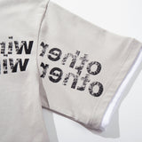 DAXUEN Layered distressed graphic t-shirt with text prints