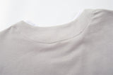 DAXUEN Layered distressed graphic t-shirt with text prints
