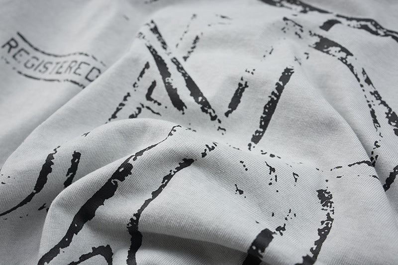 DAXUEN Graphic t-shirt featuring biker illustration and distressed text