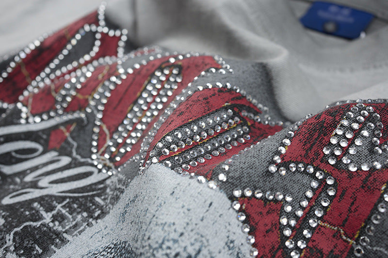 DAXUEN Oversized graphic t-shirt with distressed design