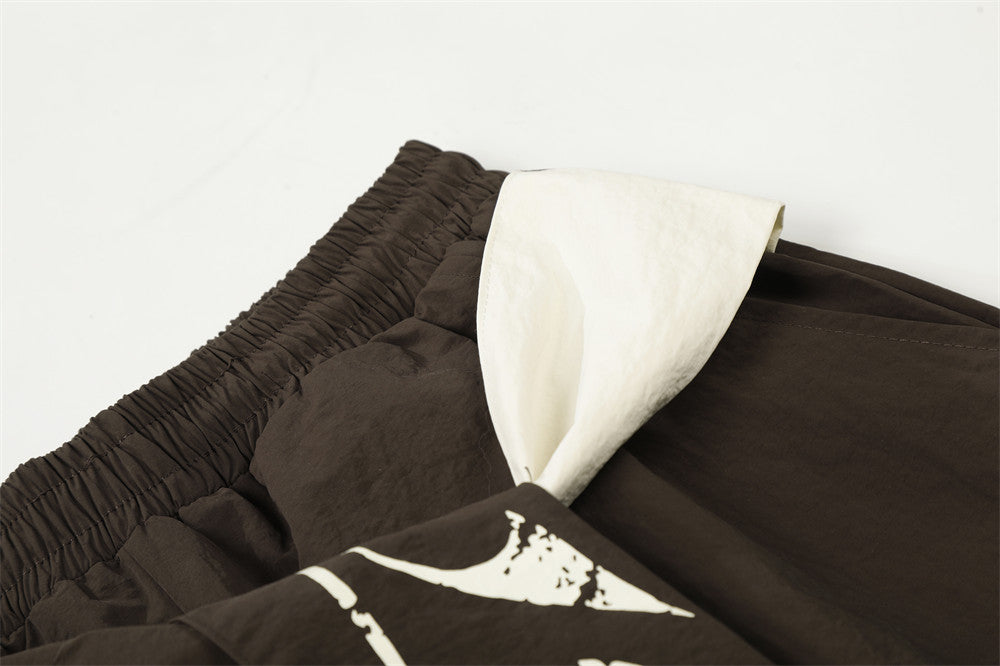DAXUEN Loose-fitting wide-leg casual pants with abstract graphics