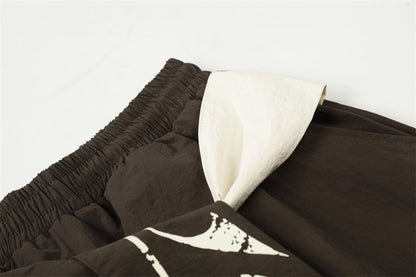 DAXUEN Loose-fitting wide-leg casual pants with abstract graphics