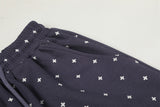 DAXUEN Wide leg sweatpants with cross print and script embroidery