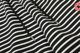 DAXUEN Black and white striped wide-leg track pants