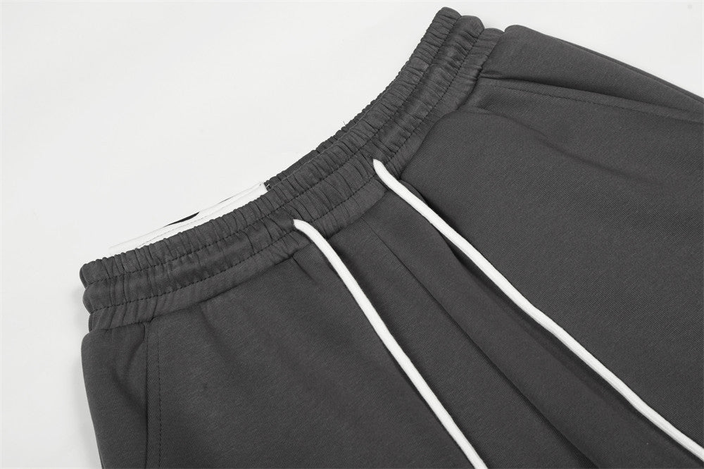 DAXUEN Dark grey wide leg sweatpants with unique graphics