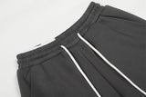 DAXUEN Dark grey wide leg sweatpants with unique graphics