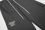 DAXUEN Dark grey wide leg sweatpants with unique graphics