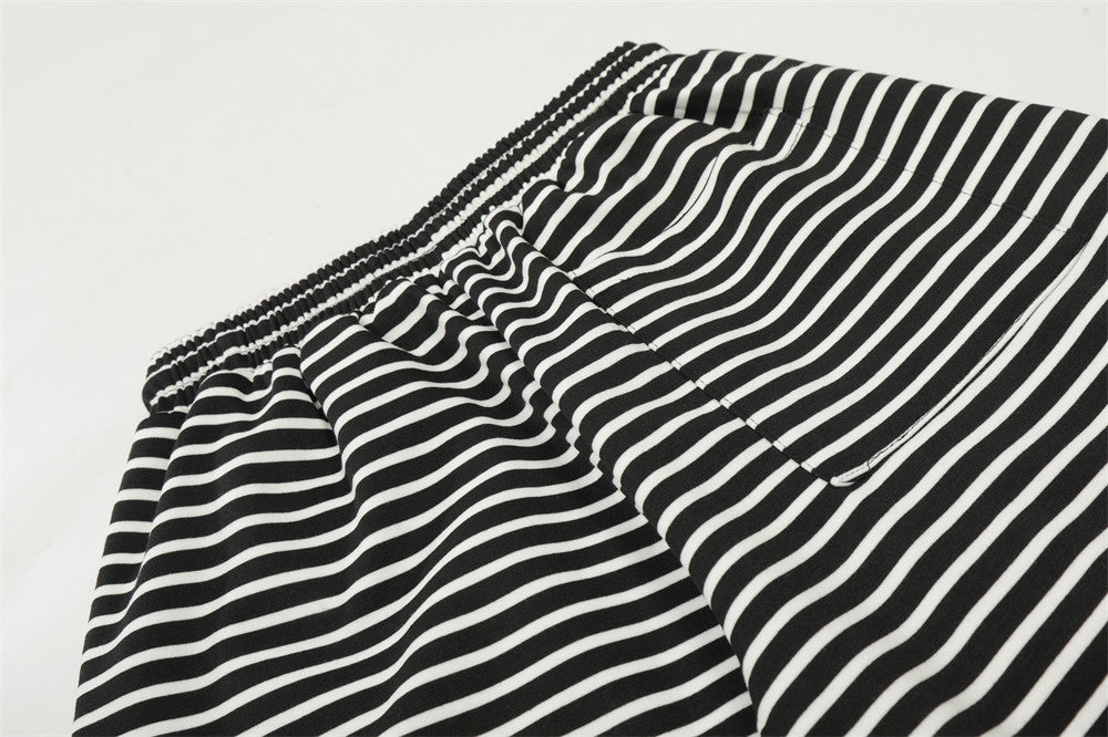 DAXUEN Black and white striped wide-leg track pants