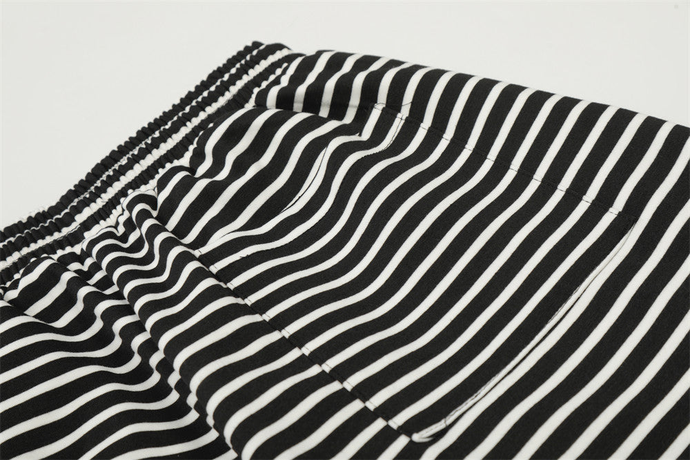 DAXUEN Black and white striped wide-leg track pants