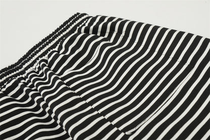 DAXUEN Black and white striped wide-leg track pants