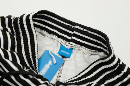 DAXUEN Black and white striped wide-leg track pants
