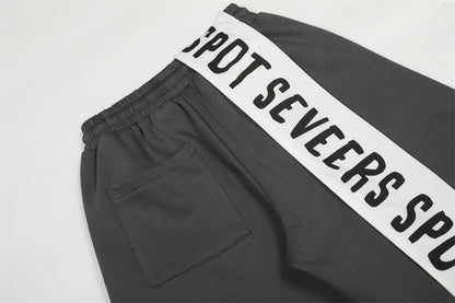 DAXUEN Dark grey wide leg sweatpants with unique graphics