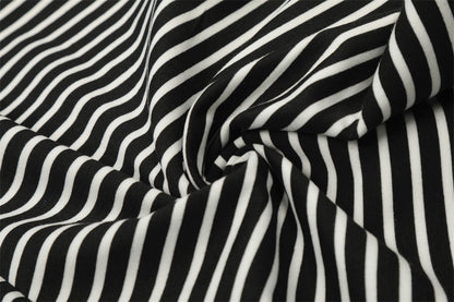 DAXUEN Black and white striped wide-leg track pants