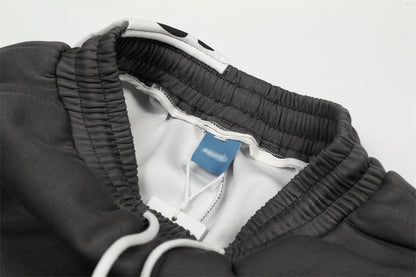 DAXUEN Dark grey wide leg sweatpants with unique graphics