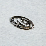 DAXUEN Short-sleeved T-shirt with metallic emblem and pleated details