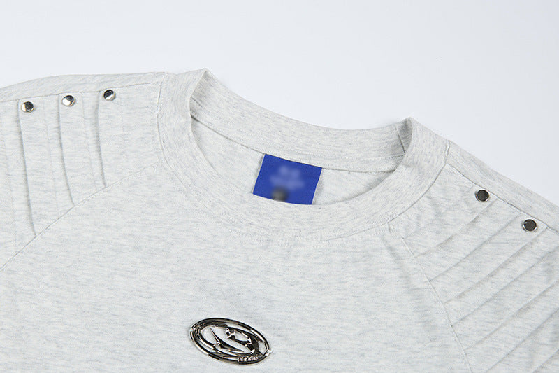 DAXUEN Short-sleeved T-shirt with metallic emblem and pleated details