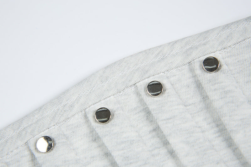 DAXUEN Short-sleeved T-shirt with metallic emblem and pleated details