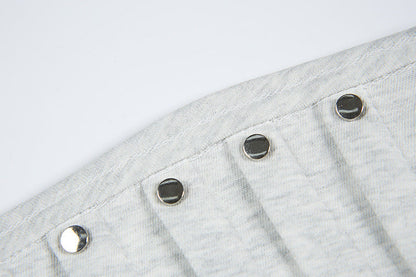DAXUEN Short-sleeved T-shirt with metallic emblem and pleated details