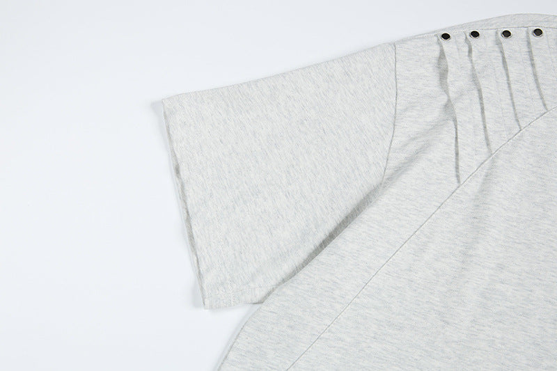 DAXUEN Short-sleeved T-shirt with metallic emblem and pleated details