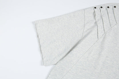 DAXUEN Short-sleeved T-shirt with metallic emblem and pleated details