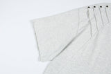 DAXUEN Short-sleeved T-shirt with metallic emblem and pleated details
