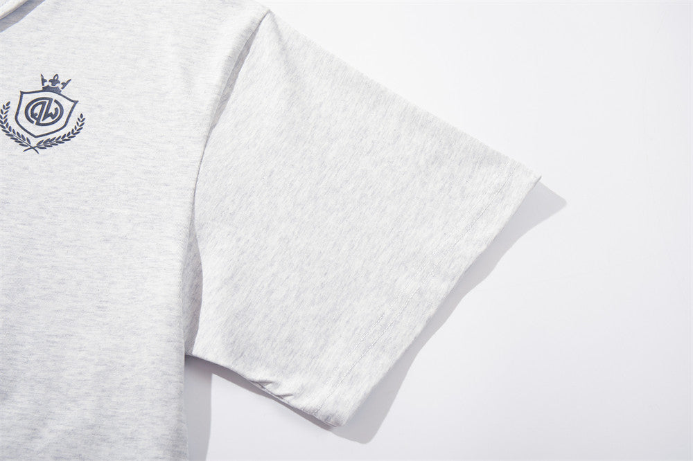 DAXUEN Graphic polo shirt with crest emblem and text