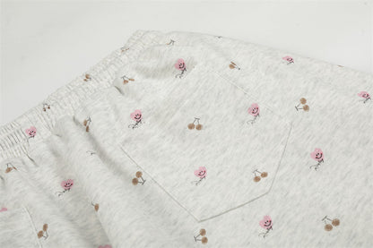 DAXUEN Wide-leg sweatpants with playful prints and embroidery