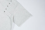 DAXUEN Distinctive short-sleeved T-shirt with emblem and pleated panels