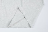 DAXUEN Distinctive short-sleeved T-shirt with emblem and pleated panels