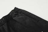 DAXUEN Distressed wide-leg sweatpants with graphic print