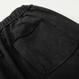 DAXUEN Distressed wide-leg sweatpants with graphic print