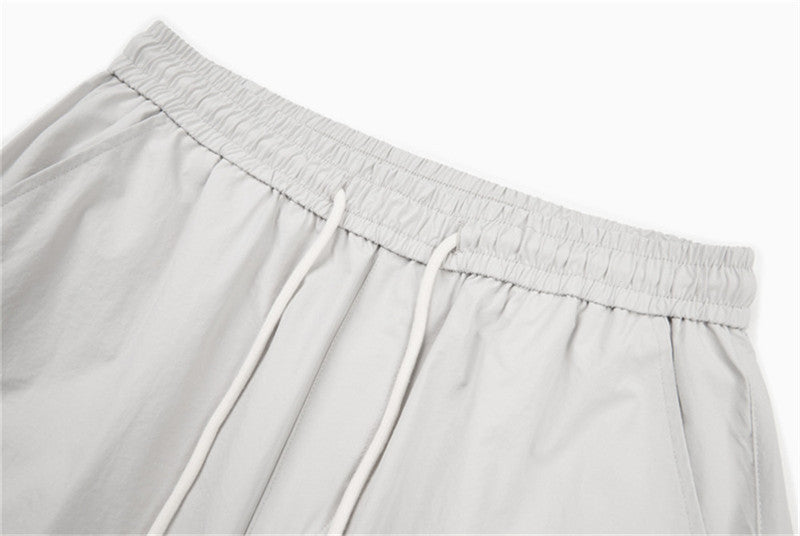 DAXUEN Loose-fitting wide-leg trousers in light grey and black