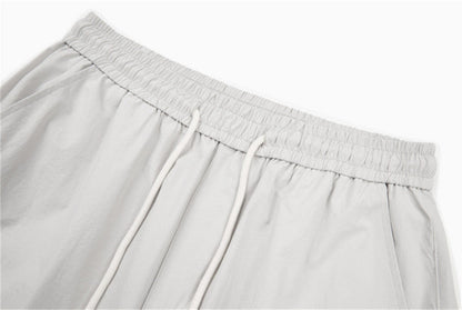 DAXUEN Loose-fitting wide-leg trousers in light grey and black