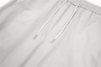 DAXUEN Loose-fitting wide-leg trousers in light grey and black