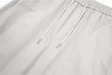 DAXUEN Loose-fitting wide-leg trousers in light grey and black