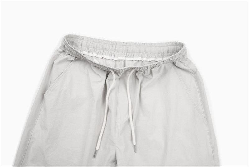 DAXUEN Loose-fitting wide-leg trousers in light grey and black