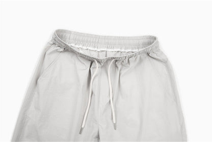 DAXUEN Loose-fitting wide-leg trousers in light grey and black