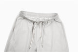 DAXUEN Loose-fitting wide-leg trousers in light grey and black