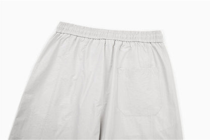DAXUEN Loose-fitting wide-leg trousers in light grey and black