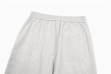 DAXUEN Loose-fitting wide-leg trousers in light grey and black