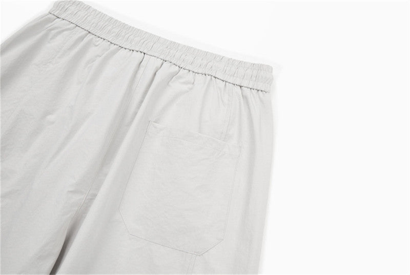 DAXUEN Loose-fitting wide-leg trousers in light grey and black