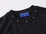 DAXUEN Oversized t-shirt with studded details and abstract logo