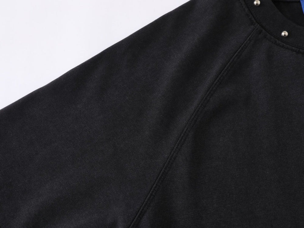 DAXUEN Oversized t-shirt with studded details and abstract logo