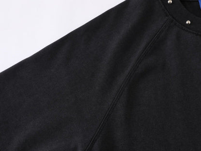 DAXUEN Oversized t-shirt with studded details and abstract logo