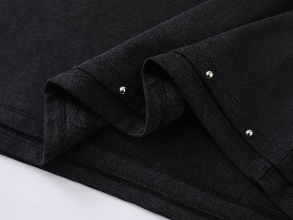 DAXUEN Oversized t-shirt with studded details and abstract logo